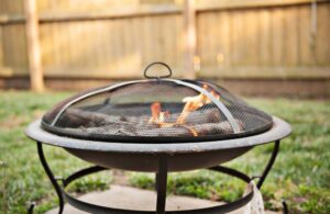 Rusted Fire Ring in a Backyard