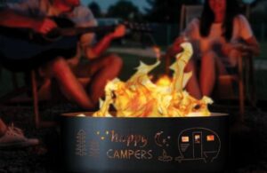 Man with Guitar and Woman  Next to Fire in Fox River Fire Rings Happy Campers Fire Ring